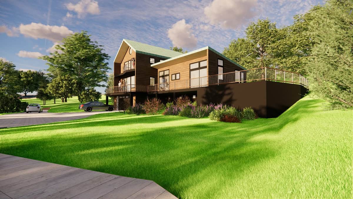 Contemporary house with large windows and spacious deck in a lush green setting.